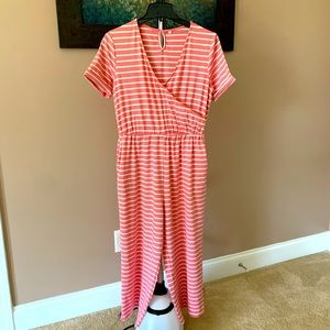 This is a coral, cotton jumpsuit. Sz. Lg.